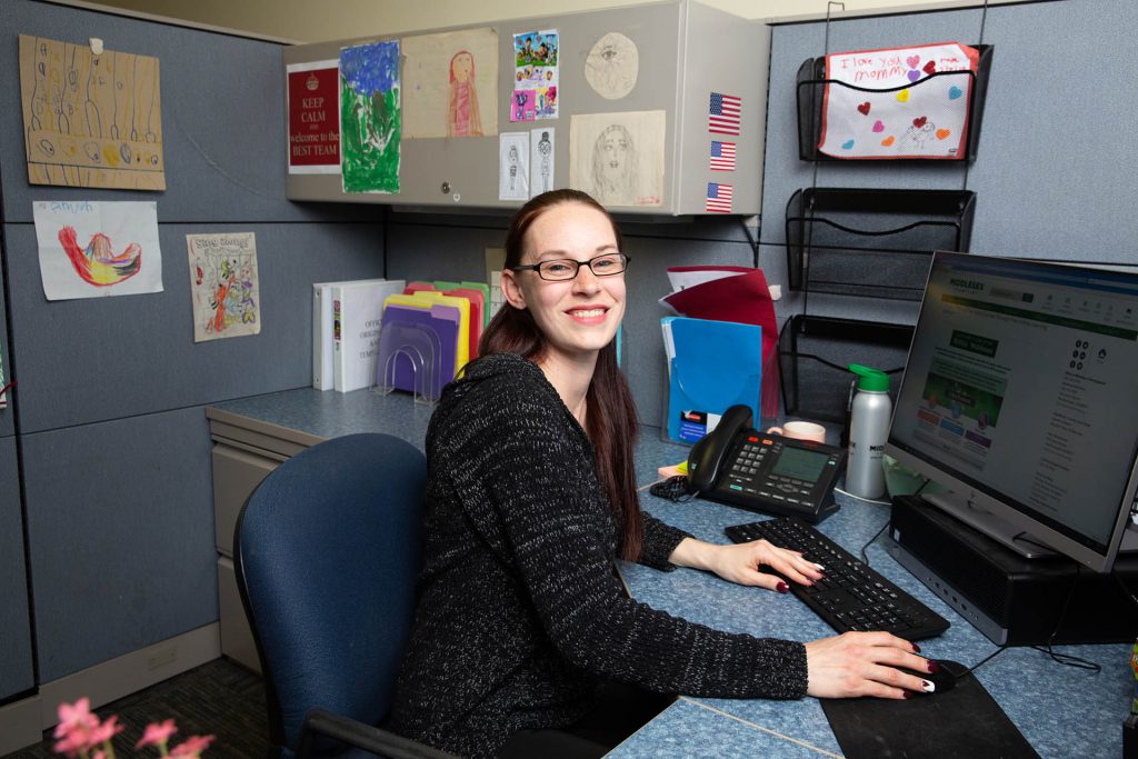 Professional woman working at a desk.
