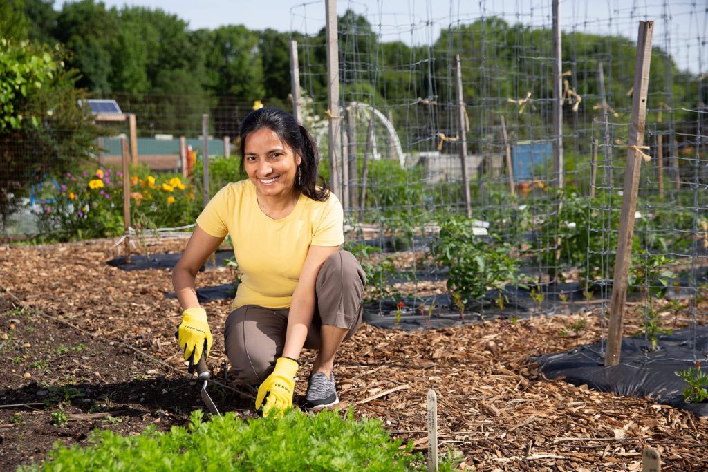 Master gardener working in a patch of soil.