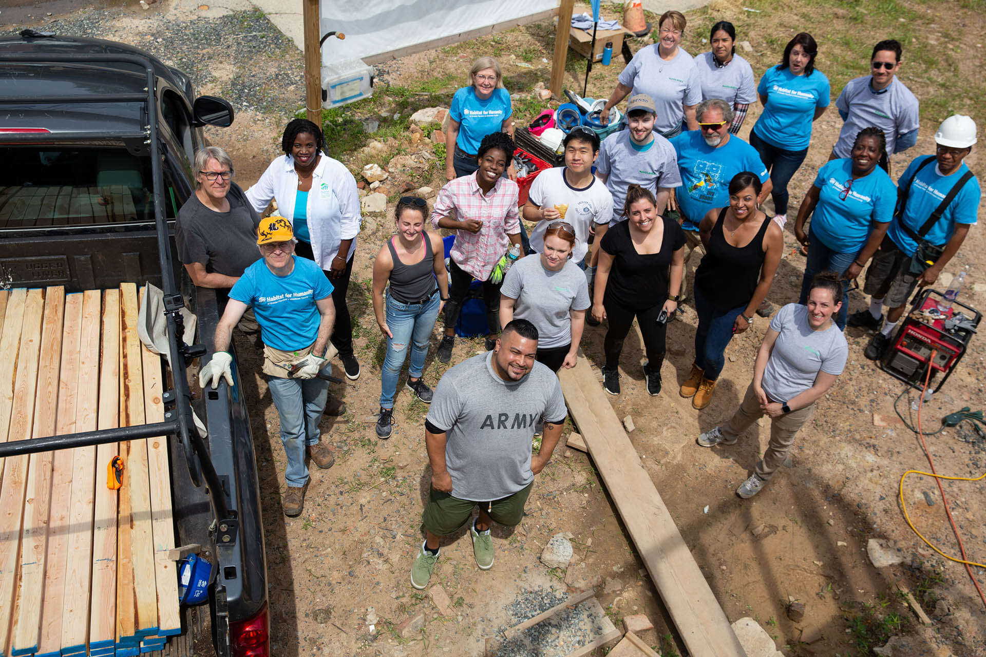 Habitat for humanity group posing for a picture.