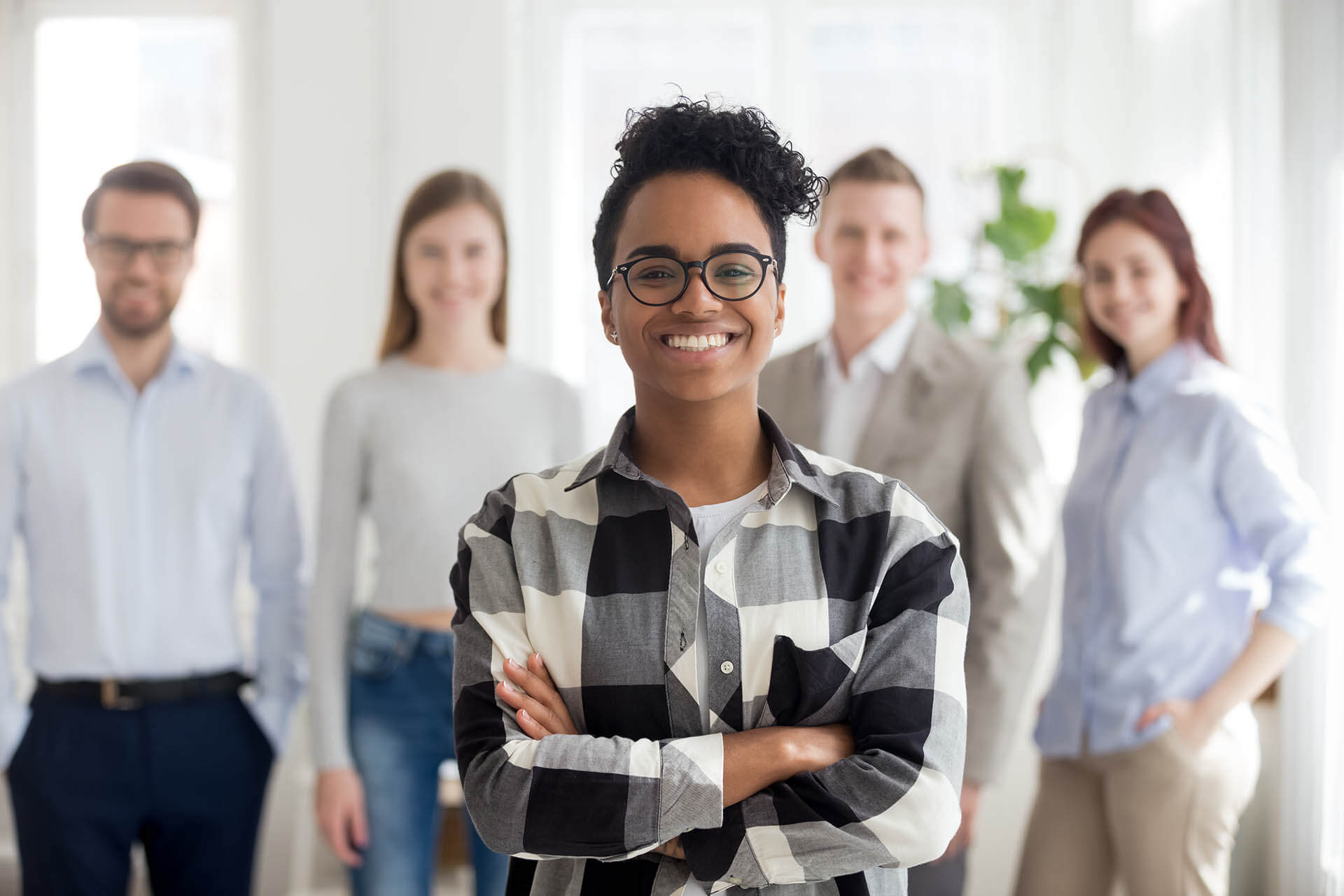 Confident people posing for a photograph.