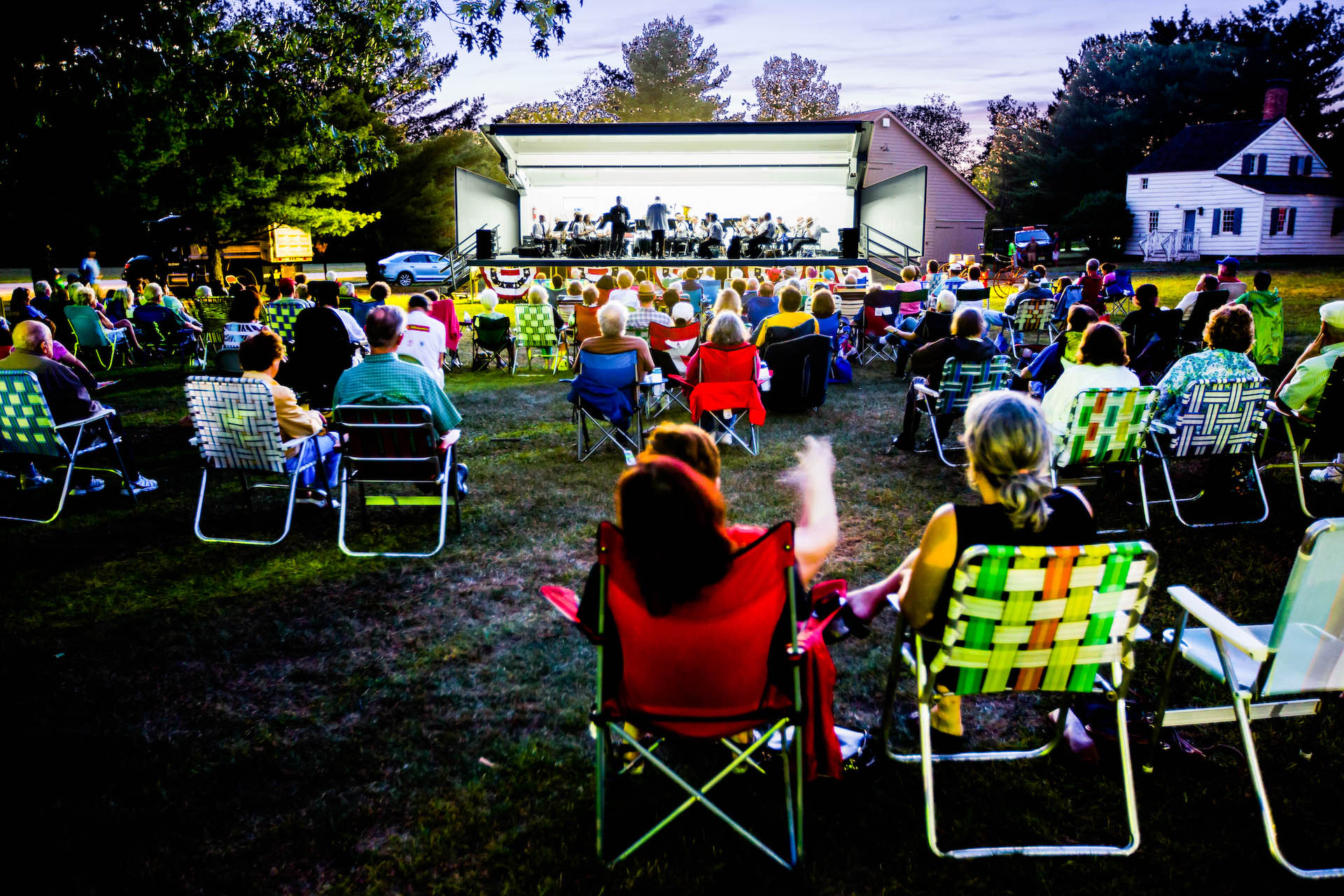 crowd enjoys one of the free summer music in the park concerts