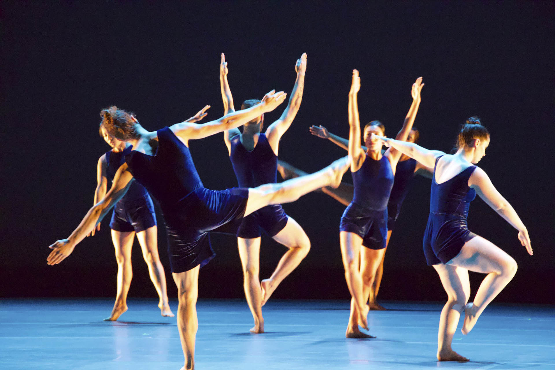 Dance students mid-performance.