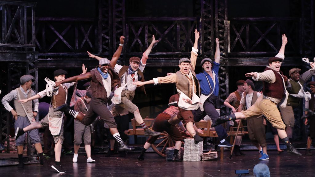 Actors performing the musical