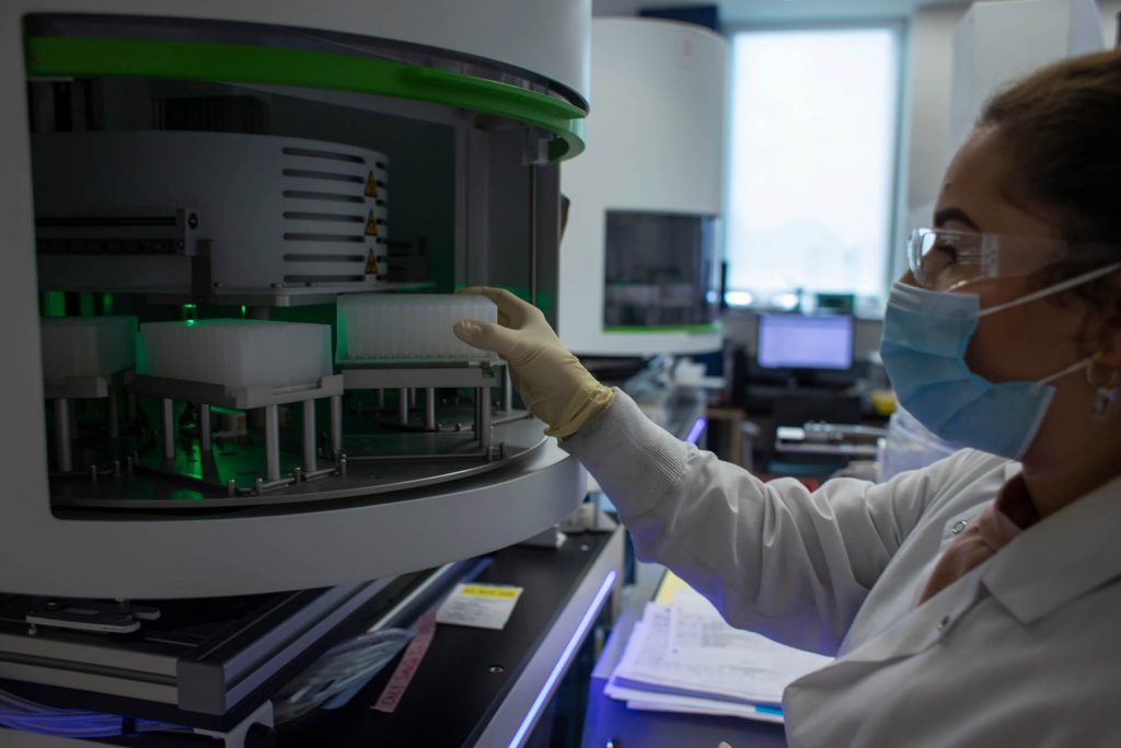 A Lab Worker at Infinite Biologics testing samples for COVID