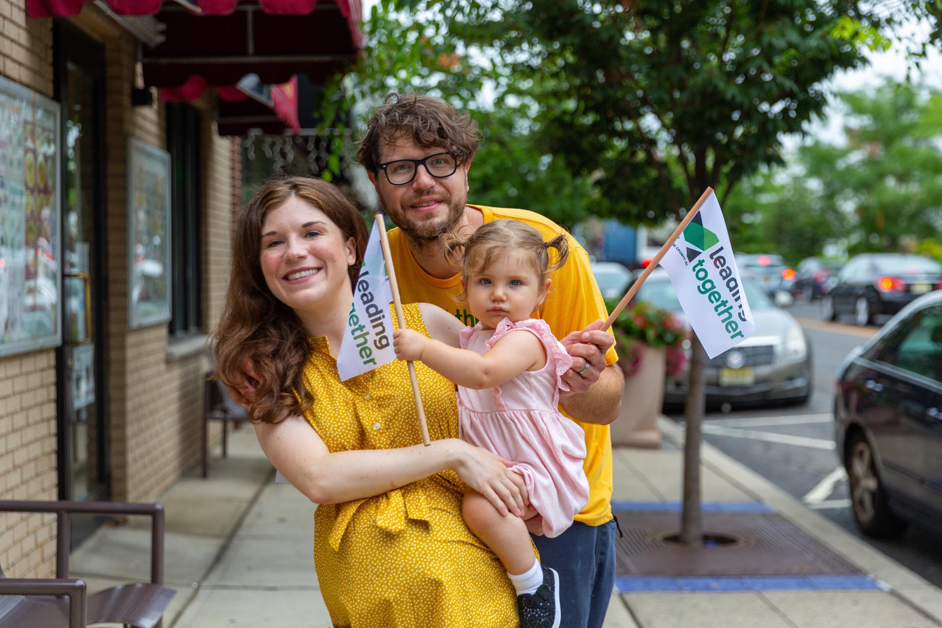 A mother, father, and toddler together in Highland Park NJ.