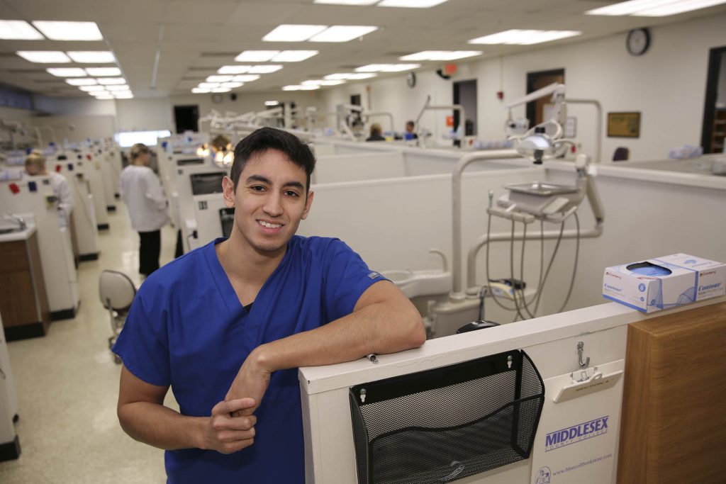 A medical student in a training room at Middlesex College.